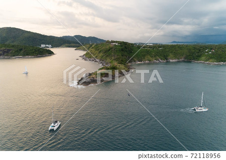 Amazing landscape nature scenery view of Beautiful tropical sea with Sea coast view in summer season image by Aerial view drone top down, high angle view Located at Laem Promthep Phuket Thailand 72118956