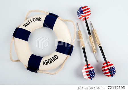Three darts with the flag of the United States of America and lifebuoy Three darts with the flag of the United States of America and lifebuoy 72119395