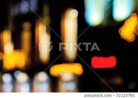 blurred street lights background. christmas holidays shopping concept blurred street lights background. christmas holidays shopping concept 72123765