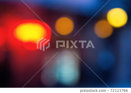 blurred street lights background. christmas holidays shopping concept blurred street lights background. christmas holidays shopping concept 72123766