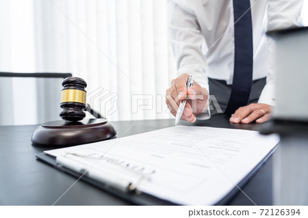 lawyer or judge meeting with client consulting help discussing contract paper agreement. lawyer or judge meeting with client consulting help discussing contract paper agreement. 72126394