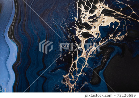 Acrylic Fluid Art. Liquid gold spill on dark blue waves of abstract ocean. Marble effect background or texture 72126689