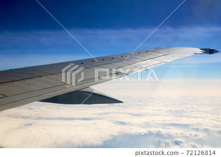 Morning sunrise with Wing of an airplane. Photo applied to tourism operators. picture for add text message or frame website. 72126814