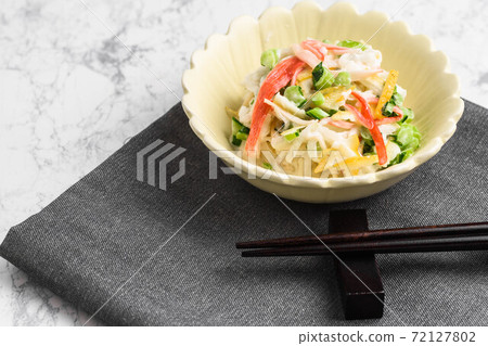 Radish and crab stick salad 72127802