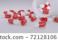 Close up Red and white Capsule pill on a white background. 3D illustration. 72128106