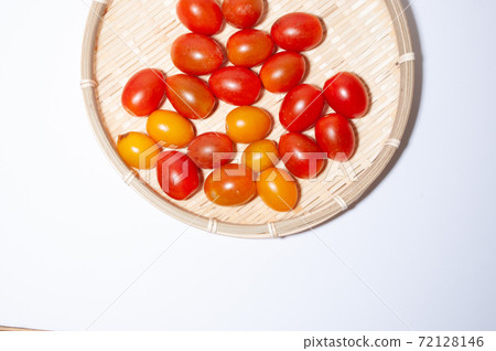 Cherry tomatoes on a colander Cherry tomatoes on a colander 72128146