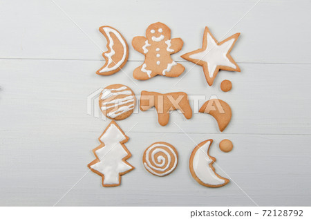 Homemade christmas cookies on wooden table 72128792