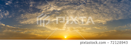 Dramatic sunrise and cloud sky nature panorama background Dramatic sunrise and cloud sky nature panorama background 72128943