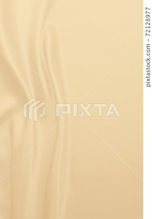Smooth elegant golden silk or satin luxury cloth texture as wedding background. Luxurious background design. In Sepia toned. Retro style Smooth elegant golden silk or satin luxury cloth texture as wedding background. Luxurious background design. In Sepia toned. Retro style 72128977