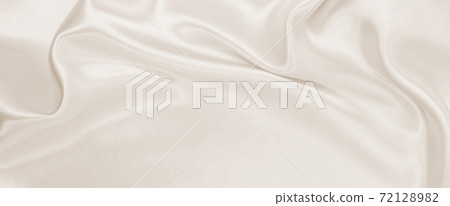 Smooth elegant golden silk or satin luxury cloth texture as wedding background. Luxurious background design. In Sepia toned. Retro style Smooth elegant golden silk or satin luxury cloth texture as wedding background. Luxurious background design. In Sepia toned. Retro style 72128982
