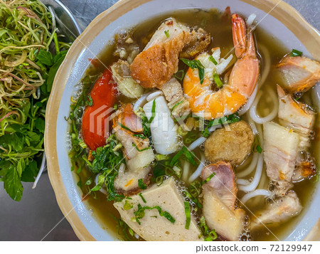 Bowl of delicious Vietnamese seafood noodles soup Bowl of delicious Vietnamese seafood noodles soup 72129947