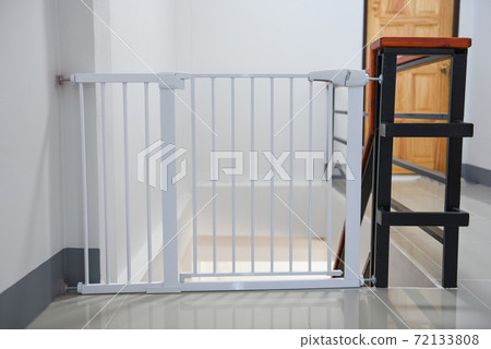 Baby gate safety door, white fence for safety children on stairs or dog gate. Baby gate safety door, white fence for safety children on stairs or dog gate. 72133808