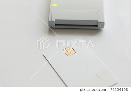 A white plastic card and a personal data reader. Theft or leakage of confidential information A white plastic card and a personal data reader. Theft or leakage of confidential information 72134108