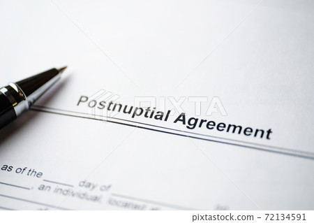 Legal document Postnuptial Agreement on paper with pen 72134591