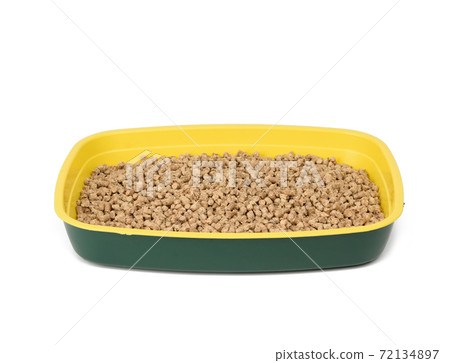 cat litter box filled with pressed sawdust 72134897