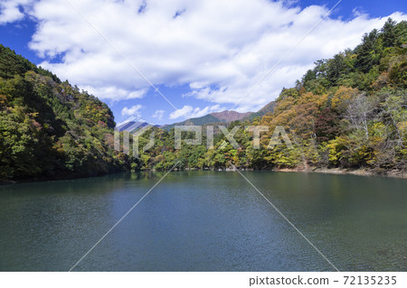 Quiet autumn Lake Okutama lakeside November Quiet autumn Lake Okutama lakeside November 72135235