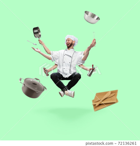 Happy handsome multi-armed chief-cooker levitating isolated on green studio background with equipment 72136261