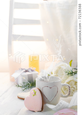 Valentine's day romantic breakfast wuth gingerbread Heart with icing and cup of coffe Valentine's day romantic breakfast wuth gingerbread Heart with icing and cup of coffe 72136388