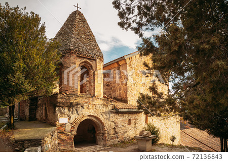 Mtskheta, Georgia. Church Of St John The Baptist In Shio-Mgvime Monastery. Medieval Monastic ShioMgvime Complex In Limestone Canyon Mtskheta, Georgia. Church Of St John The Baptist In Shio-Mgvime Monastery. Medieval Monastic ShioMgvime Complex In Limestone Canyon 72136843