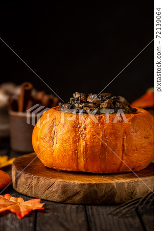 Tasty autumn stuffed pumpkin Tasty autumn stuffed pumpkin 72139064