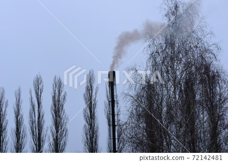 Violation of the environment. Untreated smoke from the chimney is thrown into the sky. 72142481