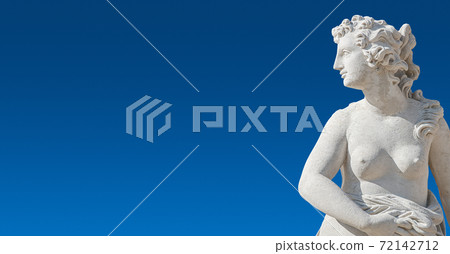 Banner with old statue of sensual bathing Renaissance Era woman at blue smooth gradient sky background with copy space, Potsdam, Germany, details, closeup 72142712