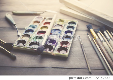 watercolor and brushes on table watercolor and brushes on table 72142858