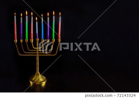 Hebrew Menorah of Hanukkah with burning candles is traditional symbol for holiday Jewish 72143324