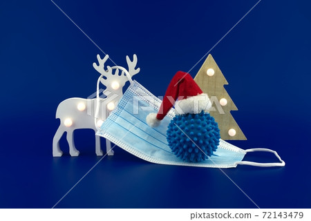 Christmas deer scene with coronavirus gift 72143479
