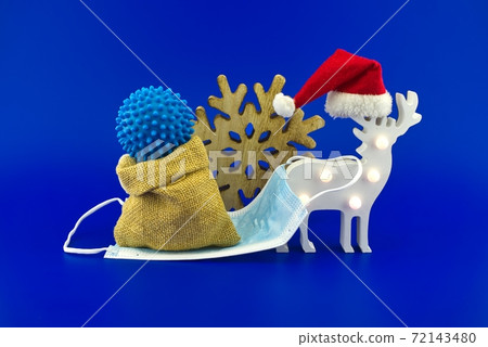 Christmas deer scene with coronavirus gift Christmas deer scene with coronavirus gift 72143480