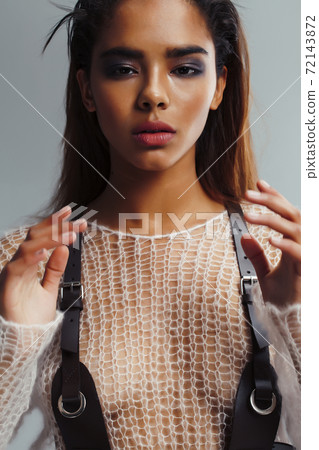 young pretty african woman with fashion makeup and clothers posing sensual on white background, lifestyle people concept young pretty african woman with fashion makeup and clothers posing sensual on white background, lifestyle people concept 72143872