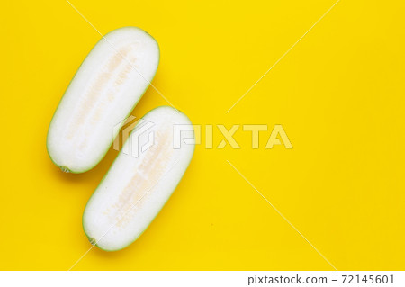 Winter melon on yellow background. Winter melon on yellow background. 72145601