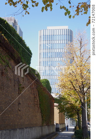 View of skyscrapers and red brick walls from the street of the Yokohama Archives of History Museum 72147008