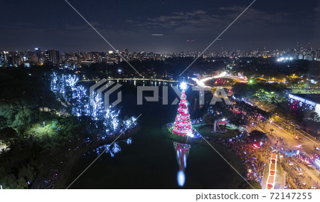 Sao Paulo city and christmas tree in Ibirapuera Park. 72147255
