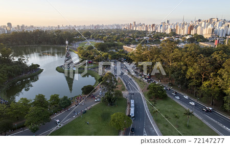 Sao Paulo city and christmas tree in Ibirapuera Park. Sao Paulo city and christmas tree in Ibirapuera Park. 72147277