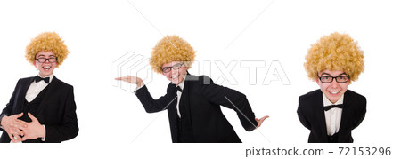 Young man wearing afro wig 72153296