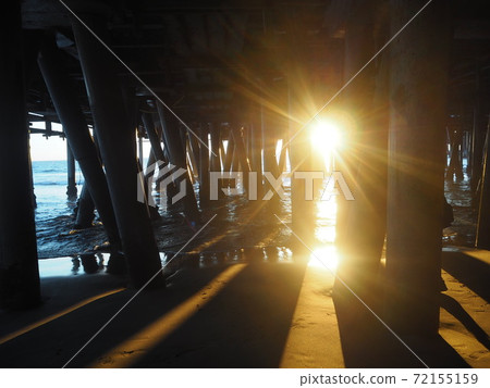 A dazzling sunset through the gap 72155159