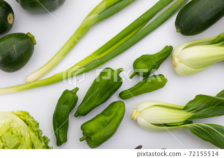 Lettuce, peppers and spring onion on white background Lettuce, peppers and spring onion on white background 72155514