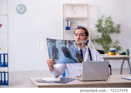 Young male doctor radiologist working in the clinic 72157476