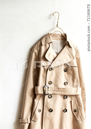Light beige trench coat and white background 72160678