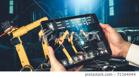 Engineer controls robotic arms by augmented reality industry technology Engineer controls robotic arms by augmented reality industry technology 72164044