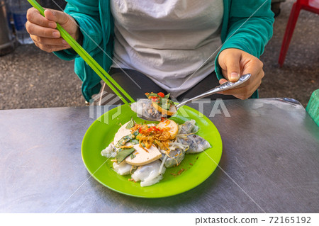 Vietnamese popular street food steamed rice roll- Banh Cuon Vietnamese popular street food steamed rice roll- Banh Cuon 72165192