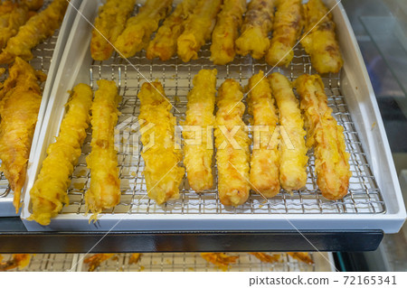 Pile of tempura fried crab stick at food stall Pile of tempura fried crab stick at food stall 72165341