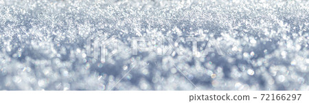 Snow crystals illuminated by sunlight. Winter background. Snow crystals illuminated by sunlight. Winter background. 72166297