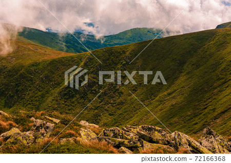 The beauty of the millennial young mountains of the Carpathians, the majesty and power of the mountains, the energy of the mountains. The beauty of the millennial young mountains of the Carpathians, the majesty and power of the mountains, the energy of the mountains. 72166368