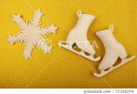 image of skates gold background 72168204