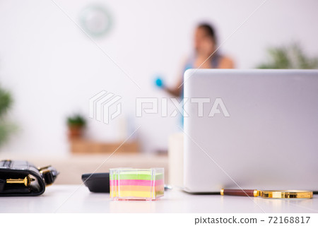 Young man working from house during pandemic Young man working from house during pandemic 72168817