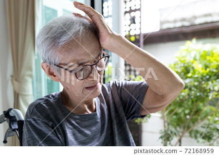 Tired exhausted asian senior woman suffering from migraine headache,old elderly holding head with her hand,feels dizziness,loss of balance or stagger,symptoms of vertigo,stupor,near unconsciousness Tired exhausted asian senior woman suffering from migraine headache,old elderly holding head with her hand,feels dizziness,loss of balance or stagger,symptoms of vertigo,stupor,near unconsciousness 72168959