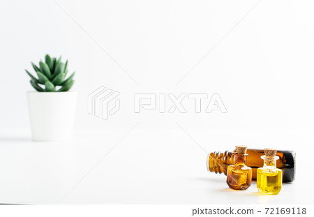 Essential Oil, Tincture or Extract Mockup with Small Bottles Essential Oil, Tincture or Extract Mockup with Small Bottles 72169118