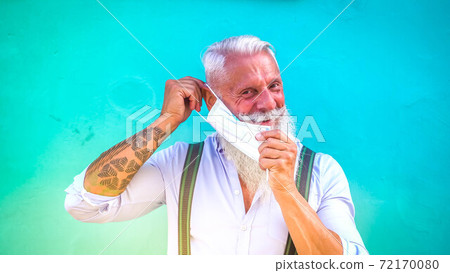 Senior man in mask 72170080